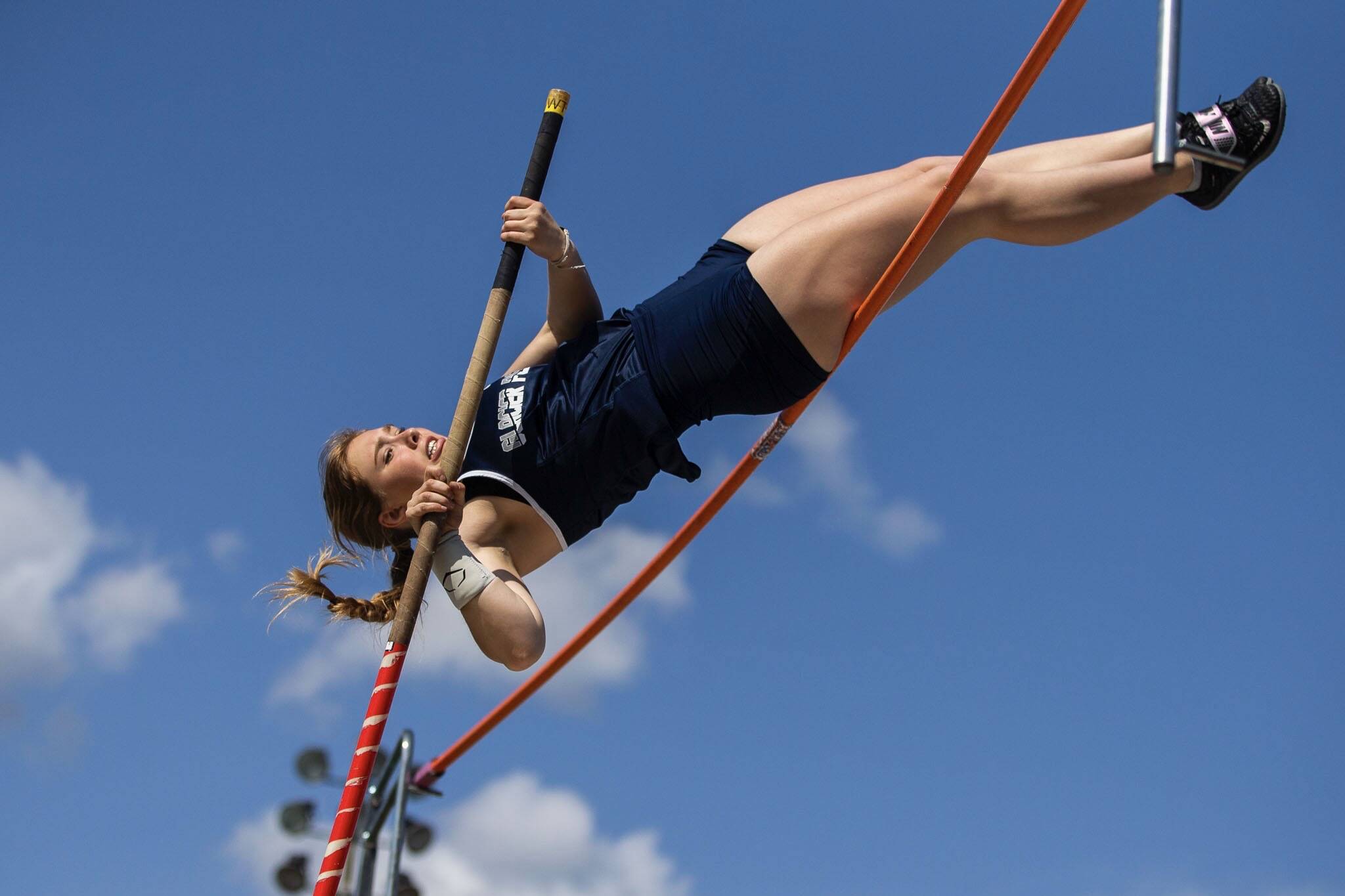 Glacier Peak’s Katherine Streissgut competes in the pole vault during Eason Invitational track and field meet on Saturday, April 23, 2022 in Snohomish, Washington. (Olivia Vanni / The Herald)