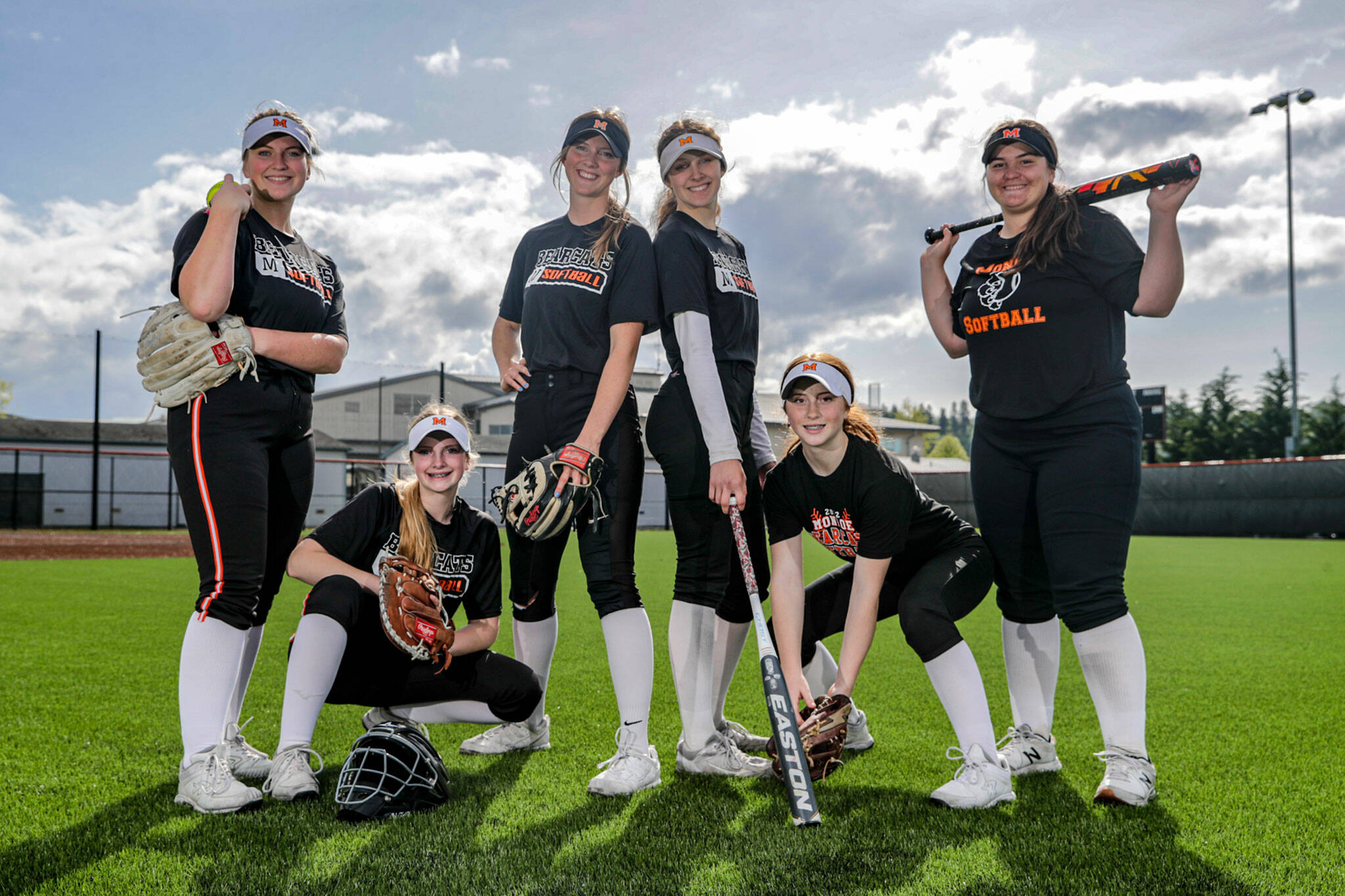 Emma Nagy (left-right), Scarlett Nagy, River Mahler, Jessi Mahler, Hadley Oylear and Anniston Oylear make up three pairs of sisters who start for the Monroe softball team. (Kevin Clark / The Herald)