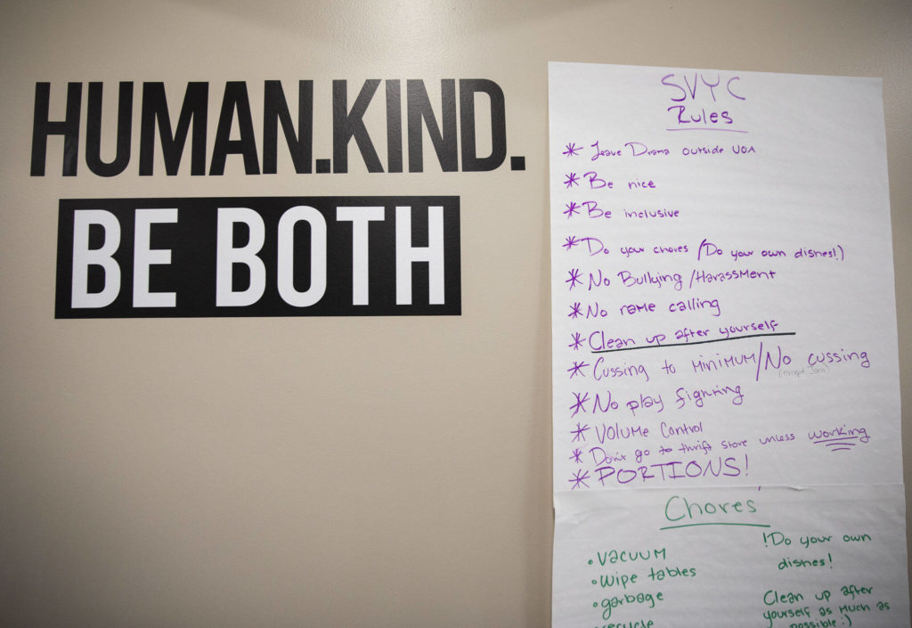 Sky Valley Youth Coalition rules hang on the wall at the new Volunteers for America storefront on May 16 in Sultan. (Olivia Vanni / The Herald)
