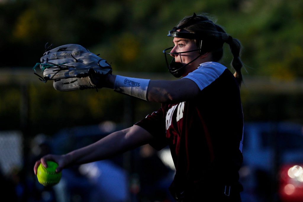 Cascade’s Abby Surowiec winds up for a pitch against Snohomish Thursday evening at Phil Johnson Ball Field in Everett, Washington on May 19, 2022. The Bruins defeated the Panthers 14-7 to claim the NW District 1 3A Championship title. (Kevin Clark / The Herald)
