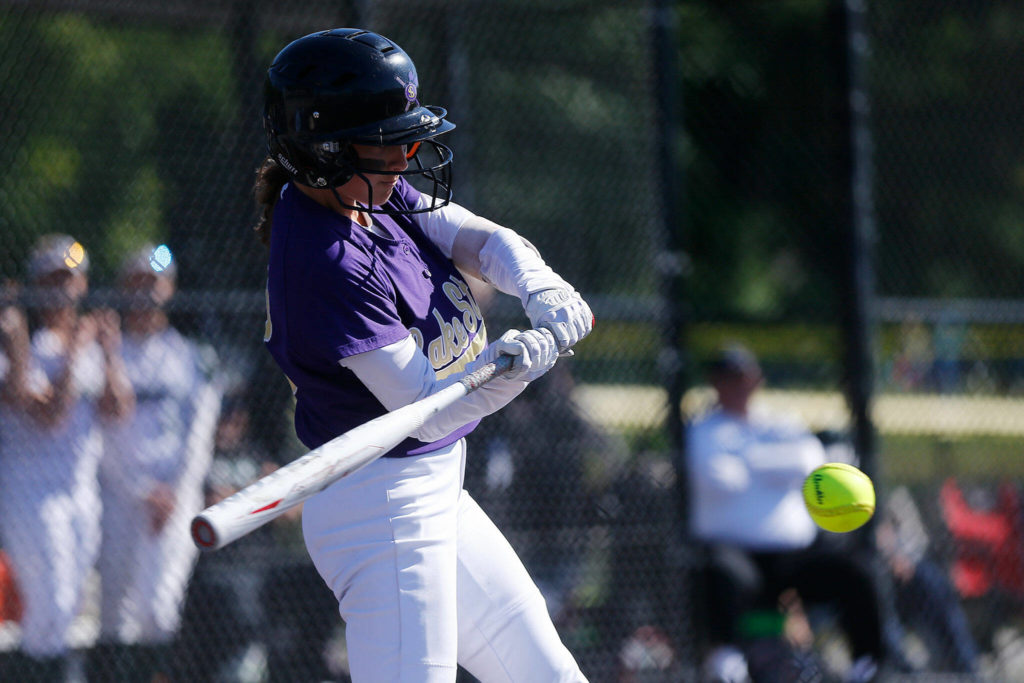 Lake Stevens’ Ava Heston takes a swing at a pitch against Jackson during a 4A bi-district matchup Friday at the Phil Johnson Ballfields in Everett. (Ryan Berry / The Herald)
