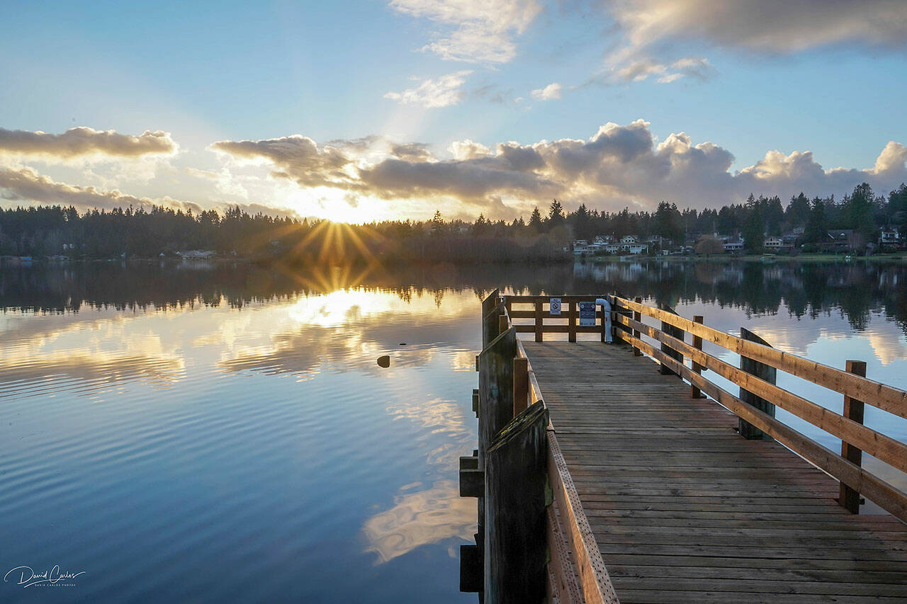 An early winter sunrise is reflected in Lake Ballinger in December of 2018. (David Carlos)
