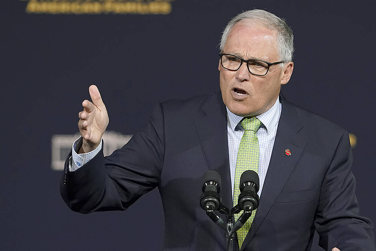 Washington Gov. Jay Inslee speaks Friday, April 22, 2022, at an event with President Joe Biden at Green River College in Auburn, Wash., south of Seattle. (AP Photo/Ted S. Warren)