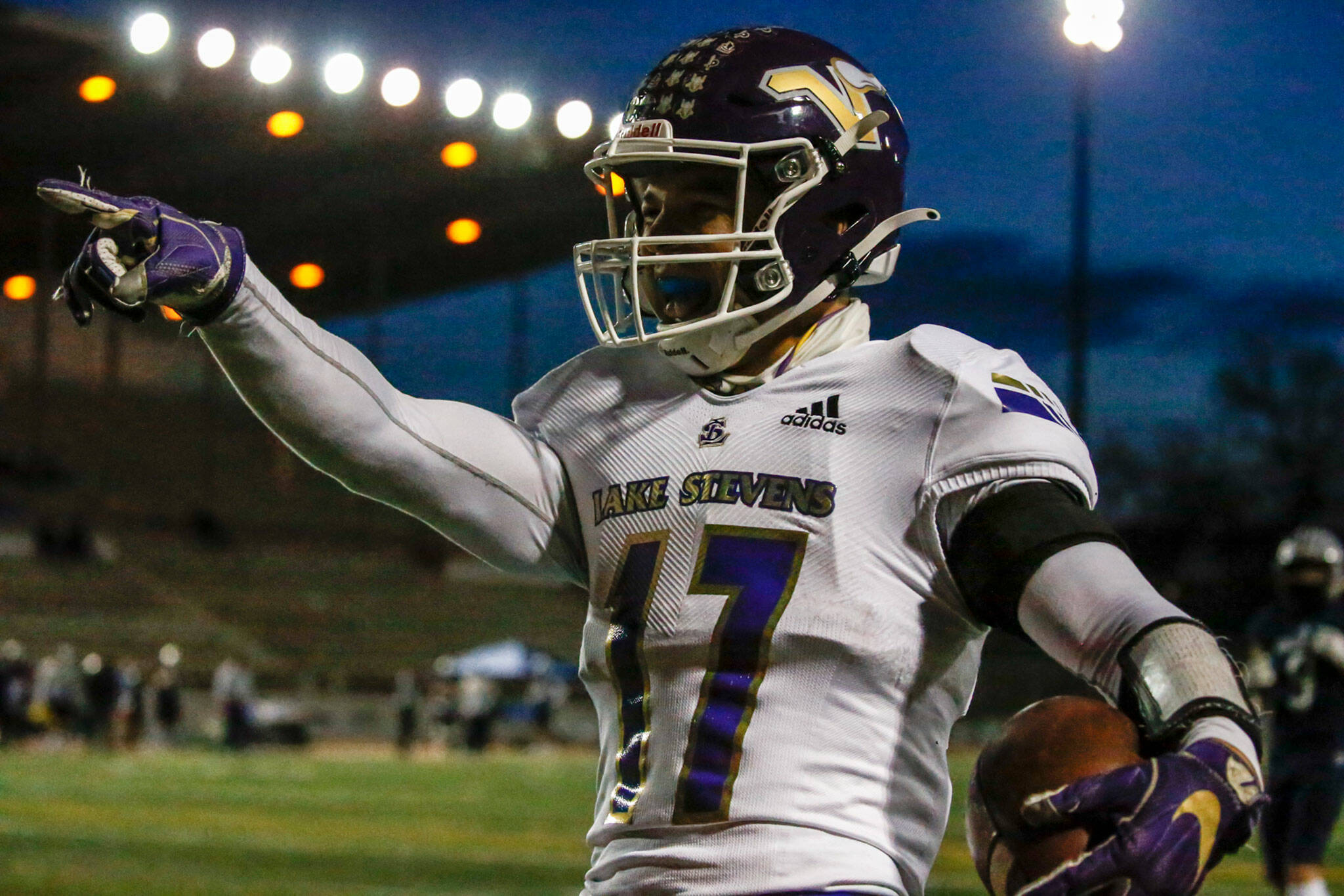 Lake Stevens running back Jayden Limar celebrates a touchdown against Glacier Peak on April 1, 2021, at Veterans Memorial Stadium in Snohomish. (Kevin Clark / The Herald)