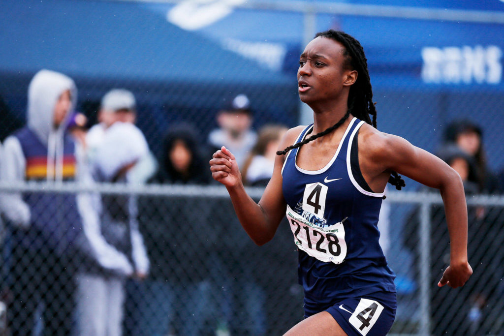 Meadowdale’s Tresley Love takes off at the beginning of the 3A girls 400 meter Saturday, May 28, 2022, at the 2022 WIAA State Track & Field Championships at Mount Tahoma High School in Tacoma, Washington. (Ryan Berry / The Herald)
