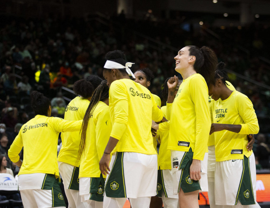 Seattle Storm’s Breanna Stewart laughs with her teammates before the start of the 3rd quarter during the game against the Liberty on Sunday, May 29, 2022 in Seattle, Washington. (Olivia Vanni / The Herald)
