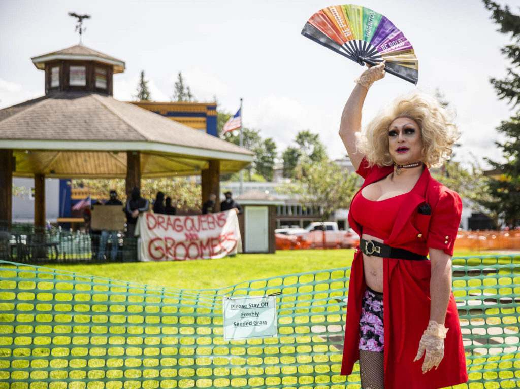 Murphy’s Lala tells Arlington’s first-ever Pride celebration crowd to “pay them no mind” in response to protestors Saturday. (Olivia Vanni / The Herald)
