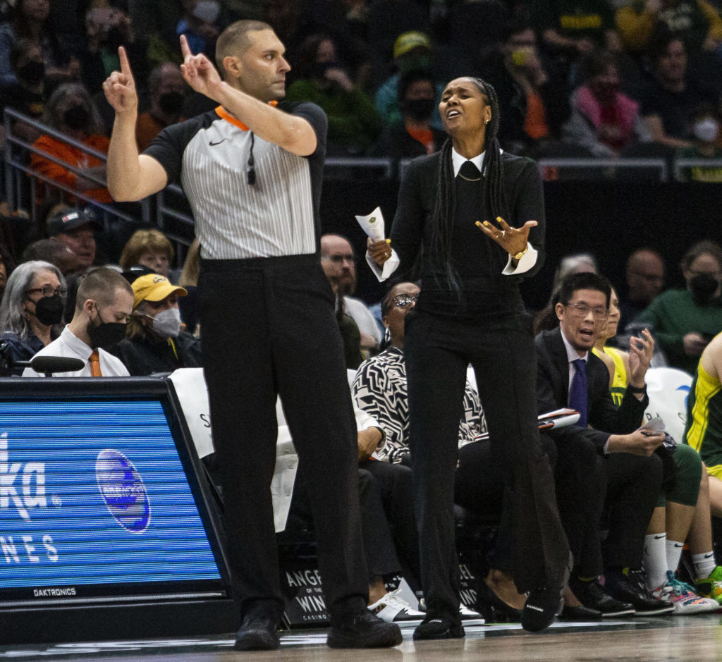 Seattle Storm head coach Noelle Quinn reacts to a foul call by the referee during the game against the Connecticut Sun on Sunday, June 5, 2022 in Seattle, Washington. (Olivia Vanni / The Herald)
