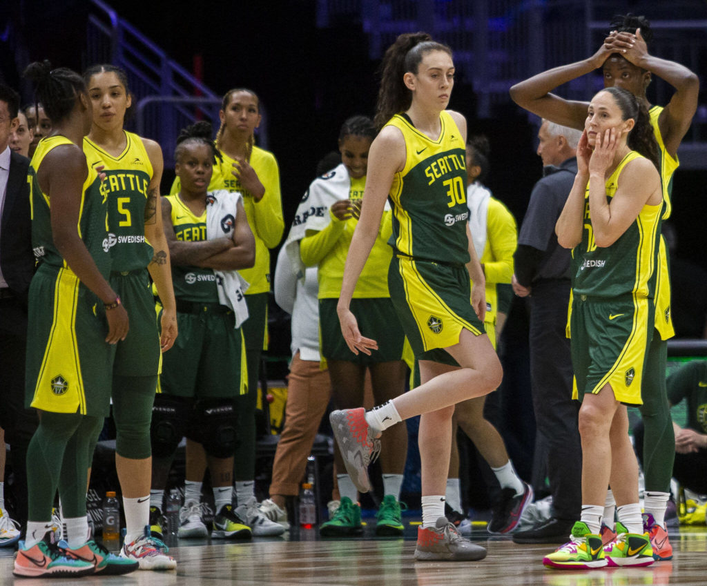 Seattle Storm players react falling behind the Connecticut Sun in the final minutes of the game on Sunday, June 5, 2022 in Seattle, Washington. (Olivia Vanni / The Herald)
