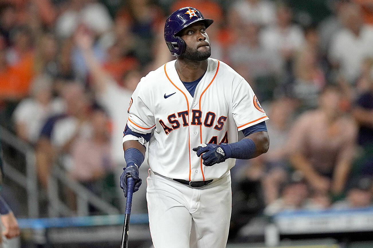Houston Astros' Yordan Alvarez watches his two-run home run against the Seattle Mariners during the eighth inning of a baseball game Tuesday, June 7, 2022, in Houston. (AP Photo/David J. Phillip)