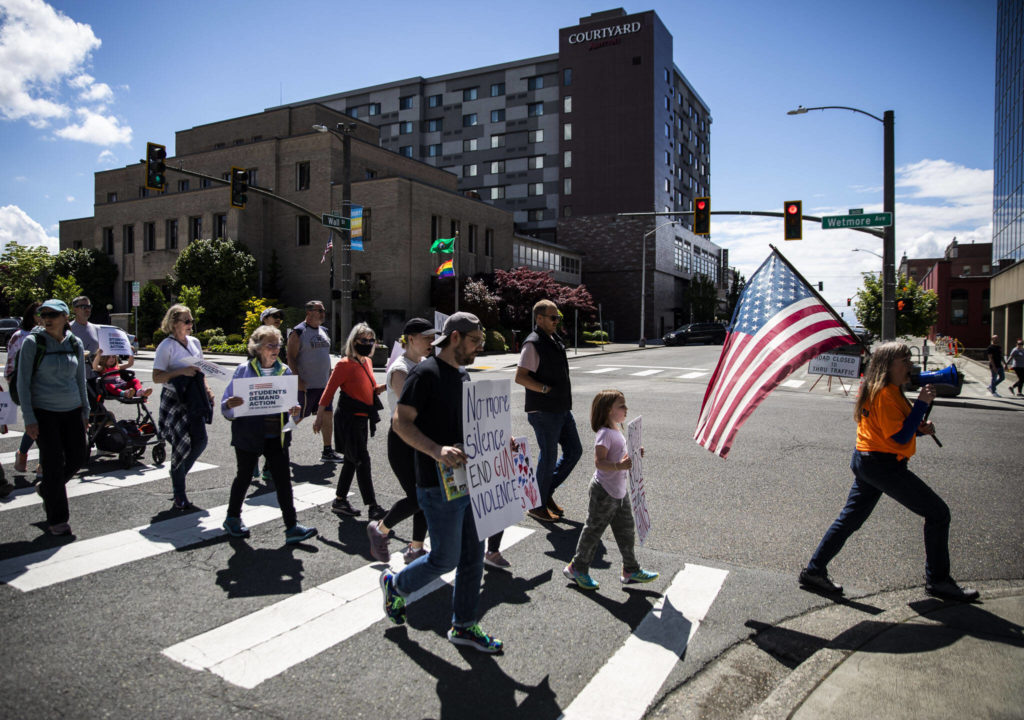 March for Our Lives protesters walk down Wetmore Avenue on Saturday in downtown Everett. (Olivia Vanni / The Herald)
