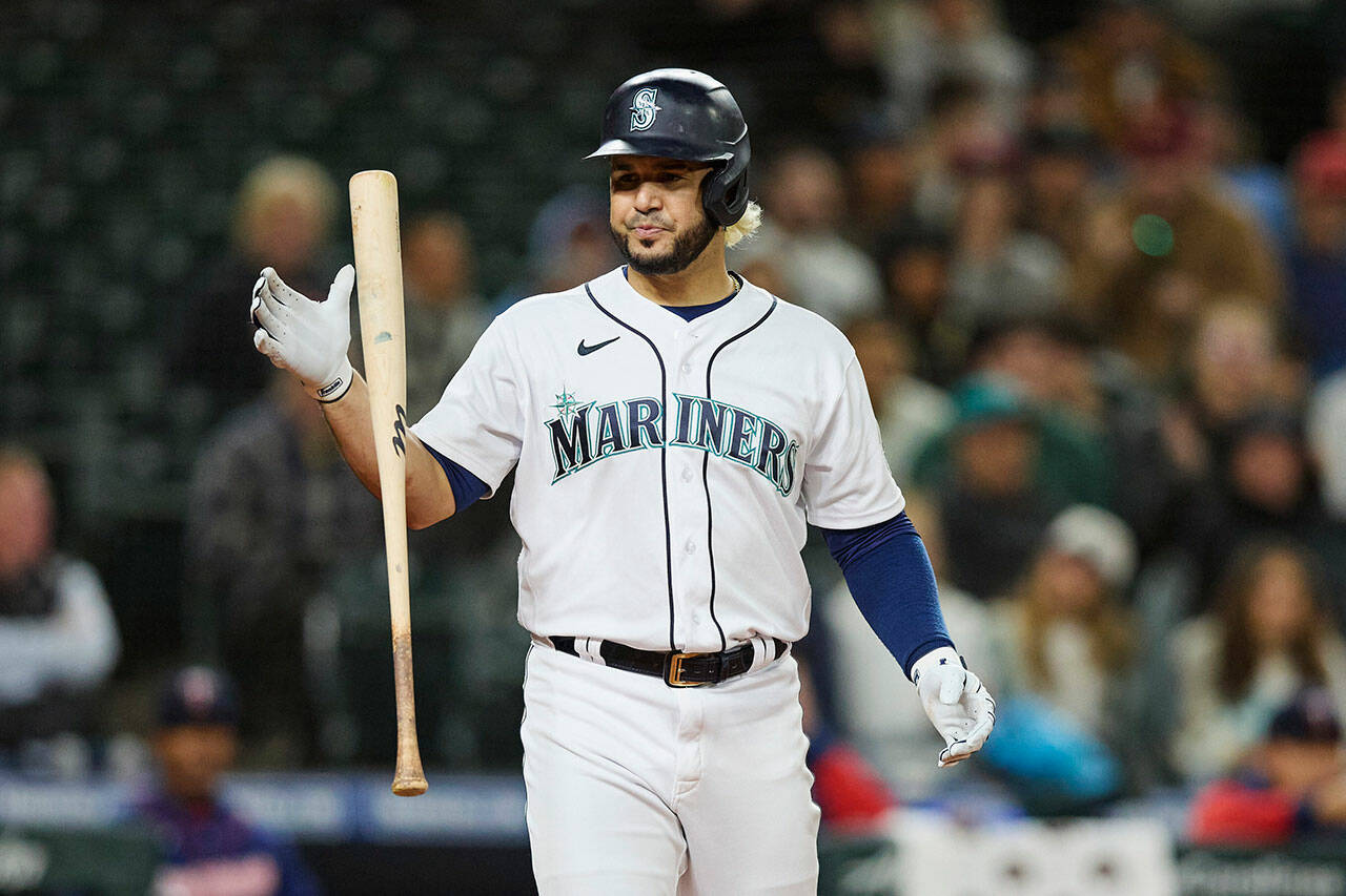 Seattle Mariners’ Eugenio Suarez reacts after striking out against the Minnesota Twins during the eighth inning of a game Monday in Seattle. The Twins won 3-2. (AP Photo/John Froschauer)