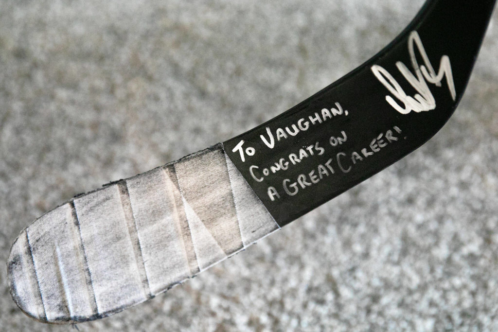 A message written by Washington Capitals great Alexander Ovechkin is written on a game-used stick given to Vaughan Rody. (Ryan Berry / The Herald)
