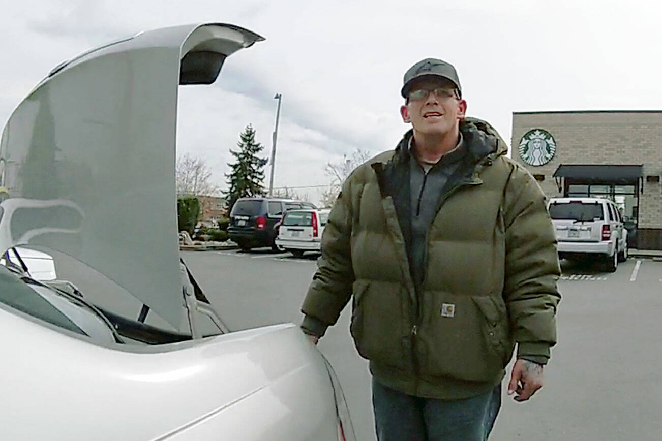 From the bodycam of Everett police officer Dan Rocha, Richard Rotter explains his possession of a firearm minutes before he allegedly shot and killed Rocha in a Starbucks parking lot in north Everett on March 25, 2022. (Everett Police Department) 20220325