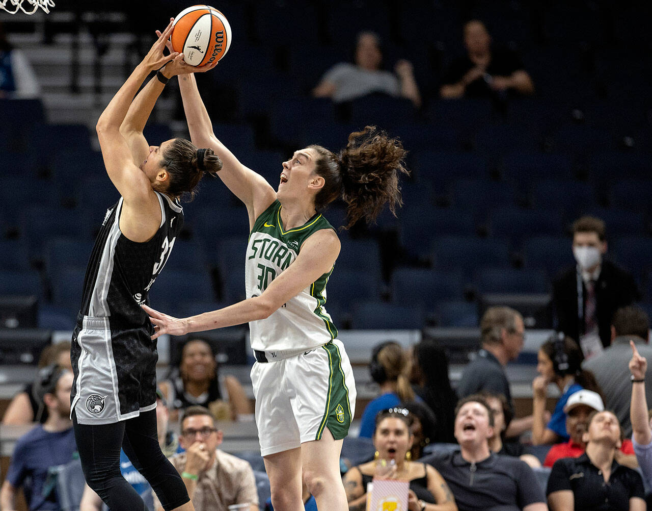 Minnesota Lynx’s Nikolina Milic (31) is fouled by Seattle Storm’s Breanna Stewart (30) during a game Tuesday in Minneapolis. (Carlos Gonzalez/Star Tribune via AP)