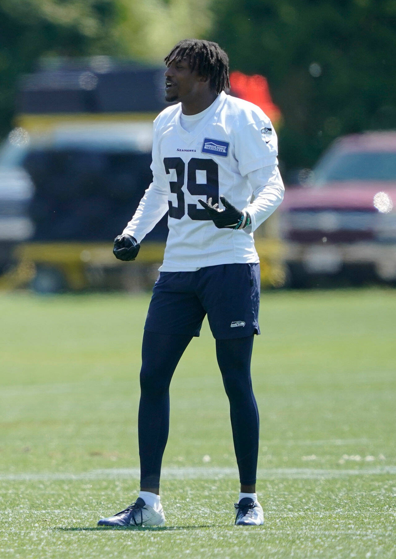 Seahawks cornerback Tariq Woolen talks to teammates during a practice on May 31 in Renton. (AP Photo/Ted S. Warren)