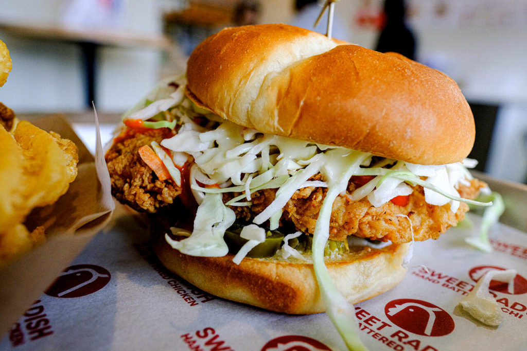 The Hotlapeno sandwich has Sweet Radish’s hand-breaded chicken, pickled jalapenos, cabbage slaw, fiery Seoul sauce and honey mayo. (Taylor Goebel / The Herald)
