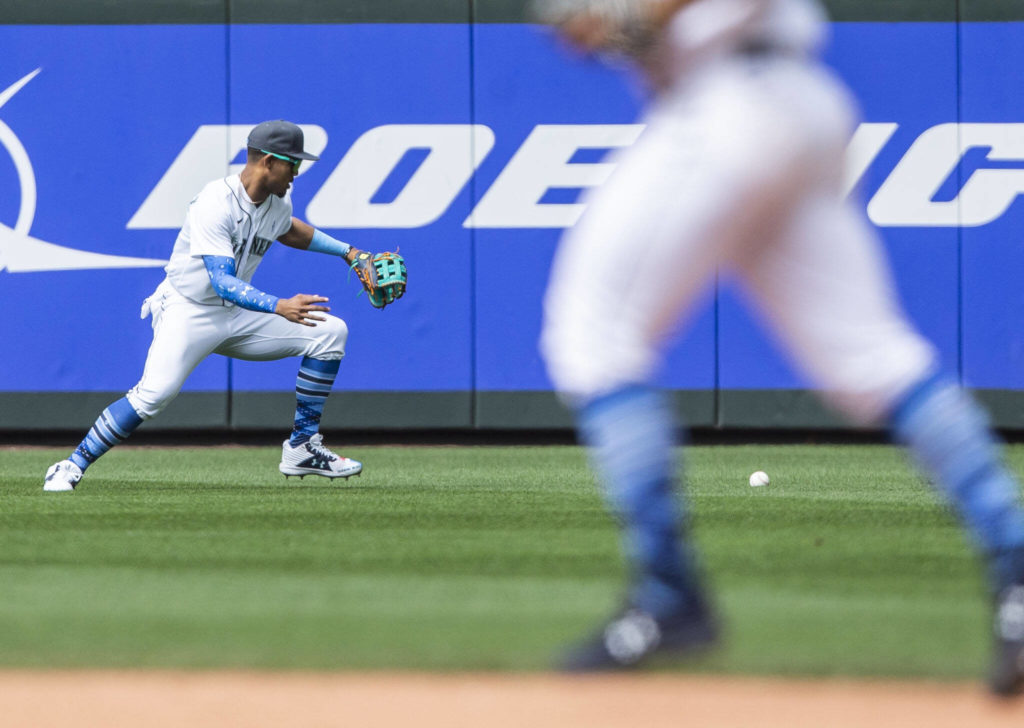 Mariners’ Julio Rodriguez misses a ground ball to the outfield during the game against the Angels on Sunday, June 19, 2022 in Seattle, Washington. (Olivia Vanni / The Herald)
