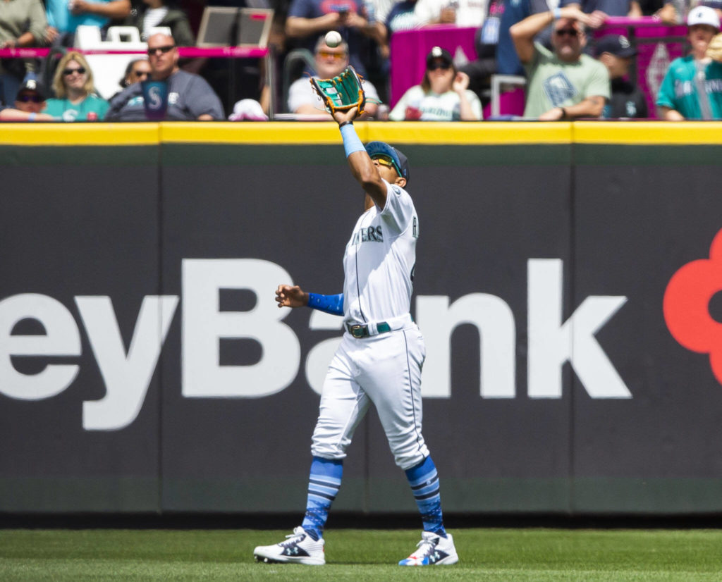 Mariners’ Julio Rodriguez makes a catch in the outfield during the game against the Angels on Sunday, June 19, 2022 in Seattle, Washington. (Olivia Vanni / The Herald)
