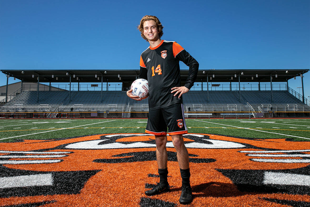 Caden Kaasa, the 2022 Boys Soccer Player of the Year, stands on his home turf Friday, June 24, 2022, at Monroe High School in Monroe, Washington. (Ryan Berry / The Herald)