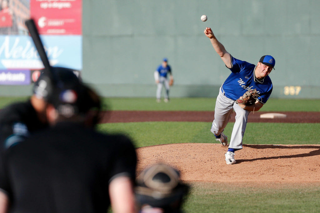 The Everett Merchants’ Tyson Willis, from Snohomish, delivers a pitch during a game against the Seattle Blackfins on Wednesday, June 22, 2022, at Funko Field in Everett, Washington. (Ryan Berry / The Herald)
