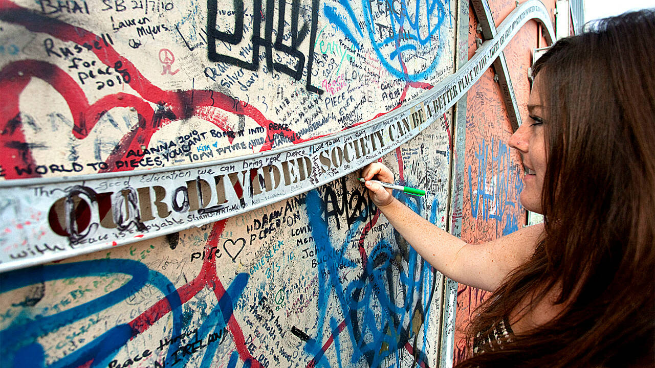 Visitors from around the world decorate Belfast’s walls with colorful messages of hope and thanksgiving. (Rick Steves’ Europe)
