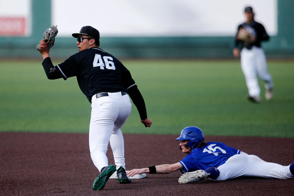 Jackson’s Dominic Hellman turns to see the umpire’s call on a close play at second base against Bothell Friday, May 13, 2022, at Funko Field in Everett, Washington. (Ryan Berry / The Herald)
