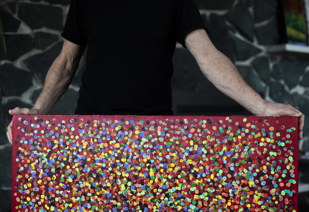 One of Oskar’s paintings featured on his album “Never Forget.” (Olivia Vanni / The Herald)
