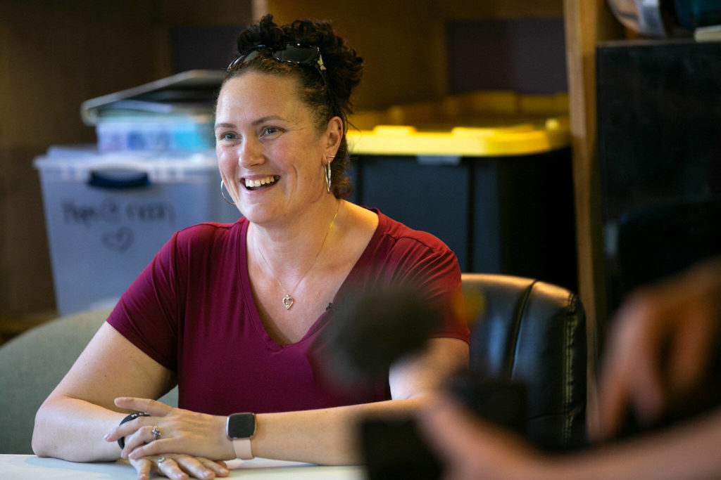 Philicia Jenny speaks about her experience getting an education after experiencing addiction during a Second Chance Foundation graduation party on June 26, in Everett. (Ryan Berry / The Herald)
