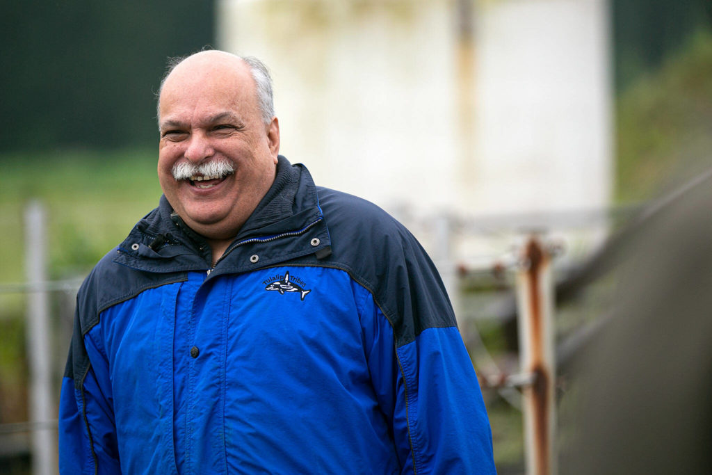 Daryl Williams, environmental liaison for the Tulalip Tribes, laughs while discussing the processes of an anaerobic digester on June 17 in Monroe. (Ryan Berry / The Herald)
