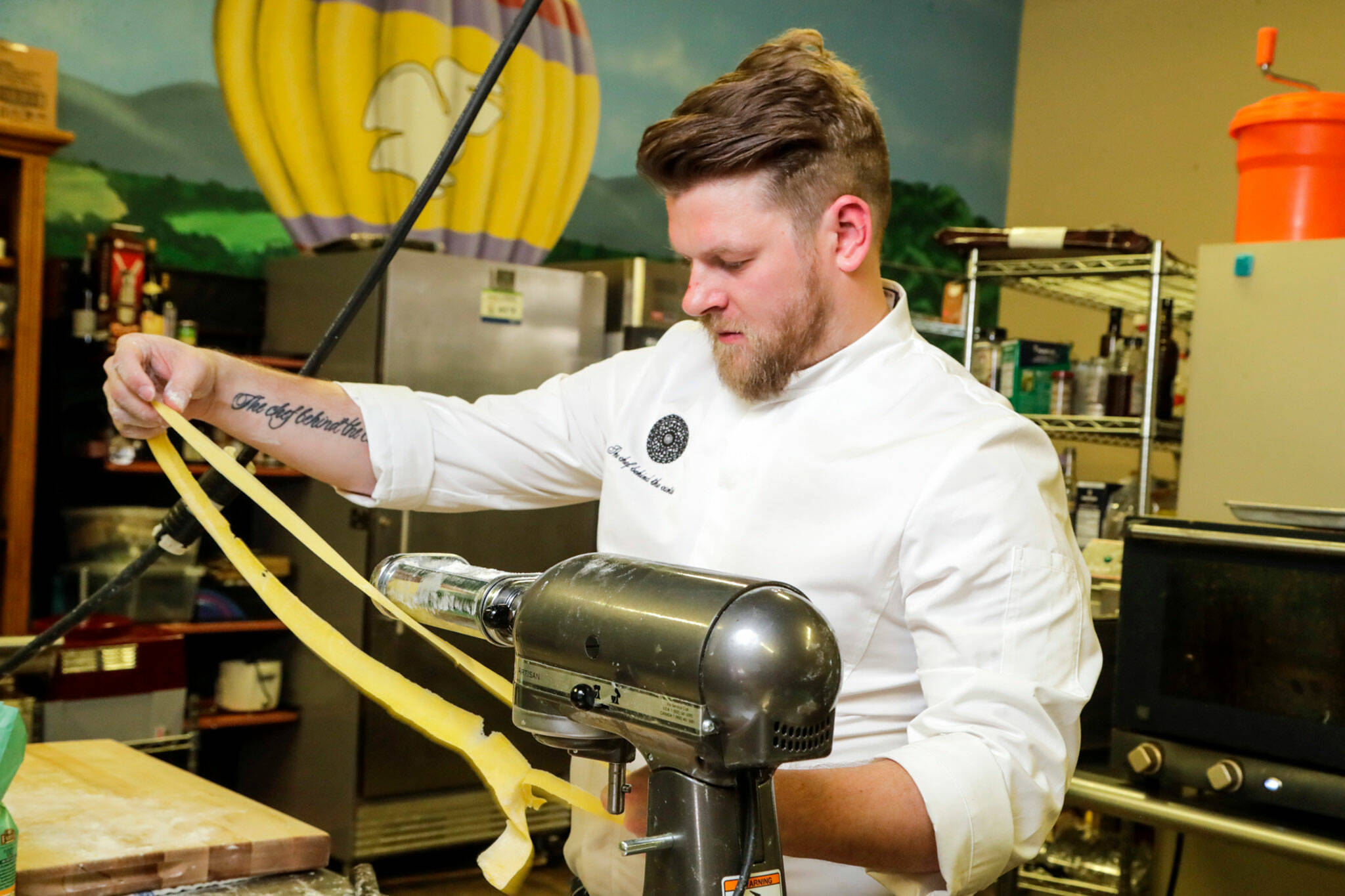 Joel Childs makes pasta at The Chef Behind The Curtain, his restaurant in Snohomish. (Kevin Clark / The Herald)