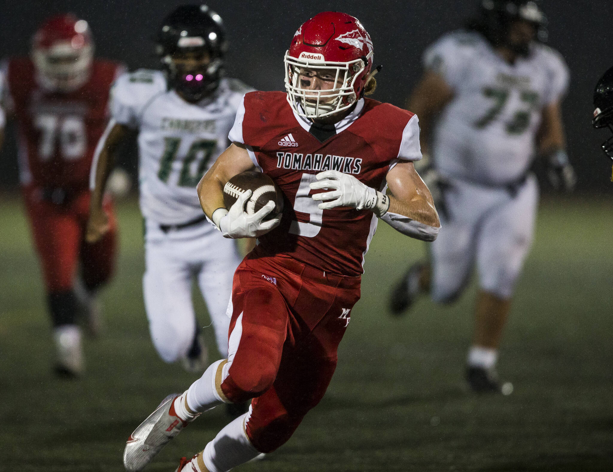 Marysville Pilchuck senior Dylan Carson compiled one of the best statistical seasons by a running back in state football history and was part of a state runner-up relay team in track. (Olivia Vanni / The Herald)