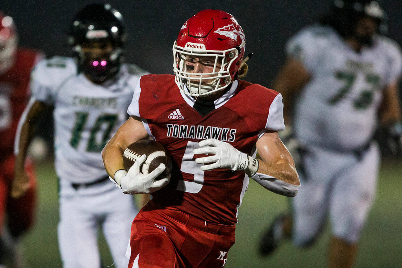 Marysville-Pilchuck's Dylan Carson runs the ball in for a touchdown during the annual Berry Bowl against Marysville Getchell on Friday, Sept. 17, 2021 in Marysville, Wa. (Olivia Vanni / The Herald)