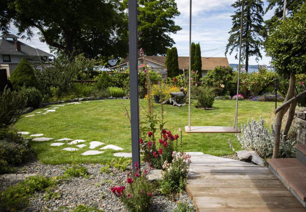 A view from the porch of the Mukilteo Garden Quilt Tour home of gardeners MaryJane Cavanagh and Les Nelson. The tour is July 16 and 17. (Olivia Vanni / The Herald)
