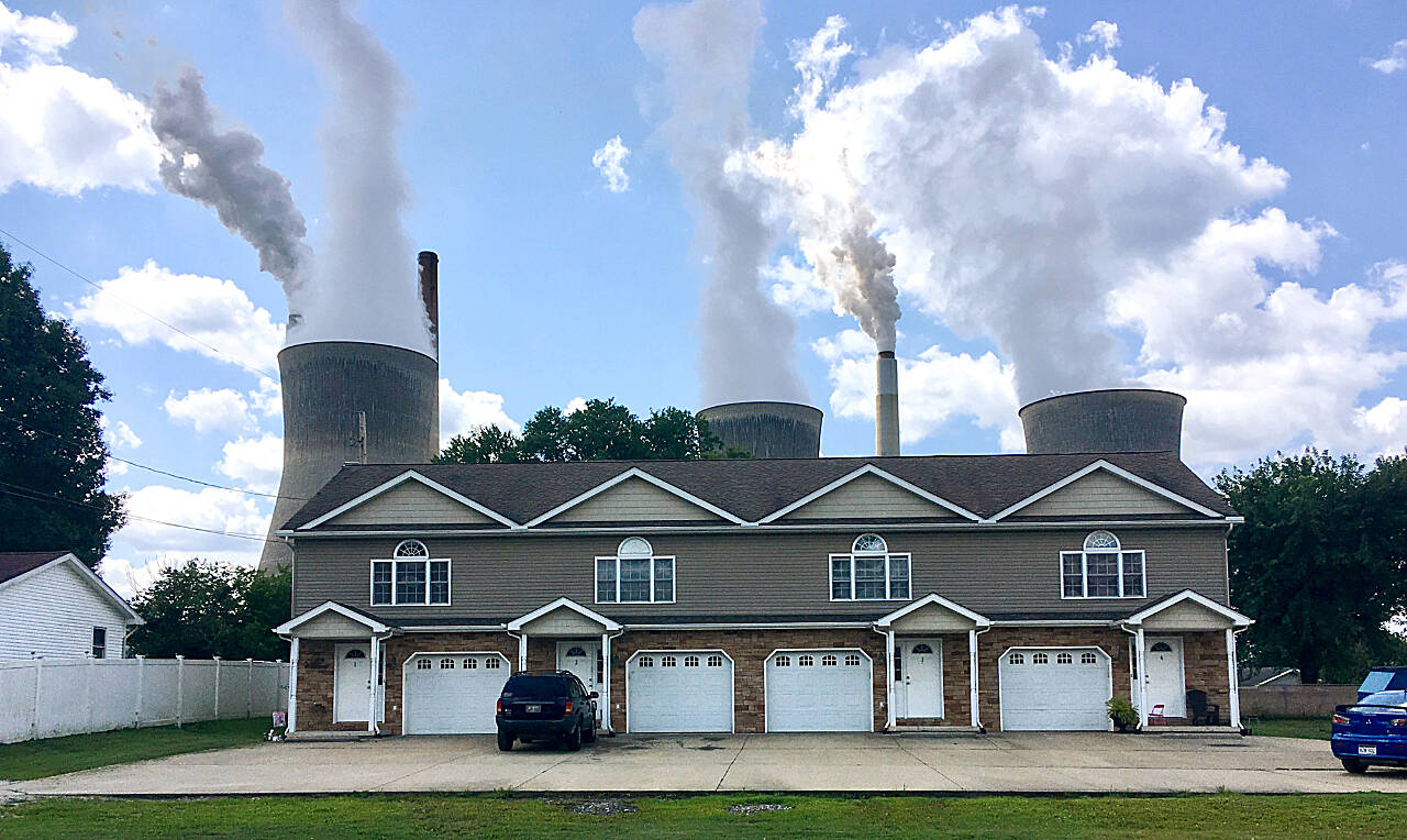 American Electric Power’s John Amos coal-fired plant in Winfield, W.Va, is seen from an apartment complex in the town of Poca across the Kanawha River in August 2018. The Supreme Court decision June 30, restricting the authority of the Environmental Protection Agency may mean continued pollution from power plants in states that are not switching to cleaner energy. But many states are switching and experts say they’ll remain free to keep cleaning up their electrical grids under the new decision. (John Raby/ Associated Press file photo)