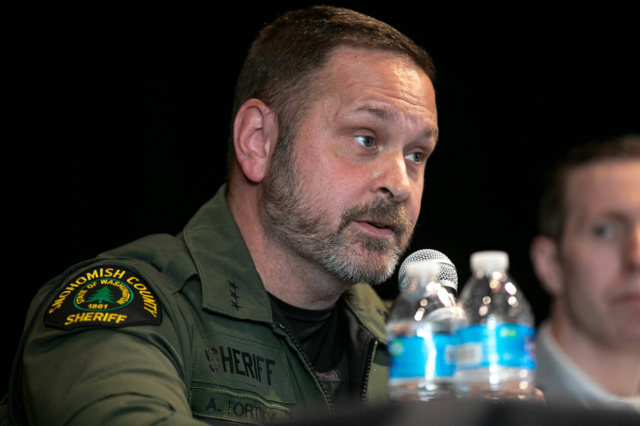 Snohomish County Sheriff Adam Fortney speaks during a public safety town hall meeting on June 8 at the Marysville Opera House in Marysville. (Ryan Berry / The Herald)