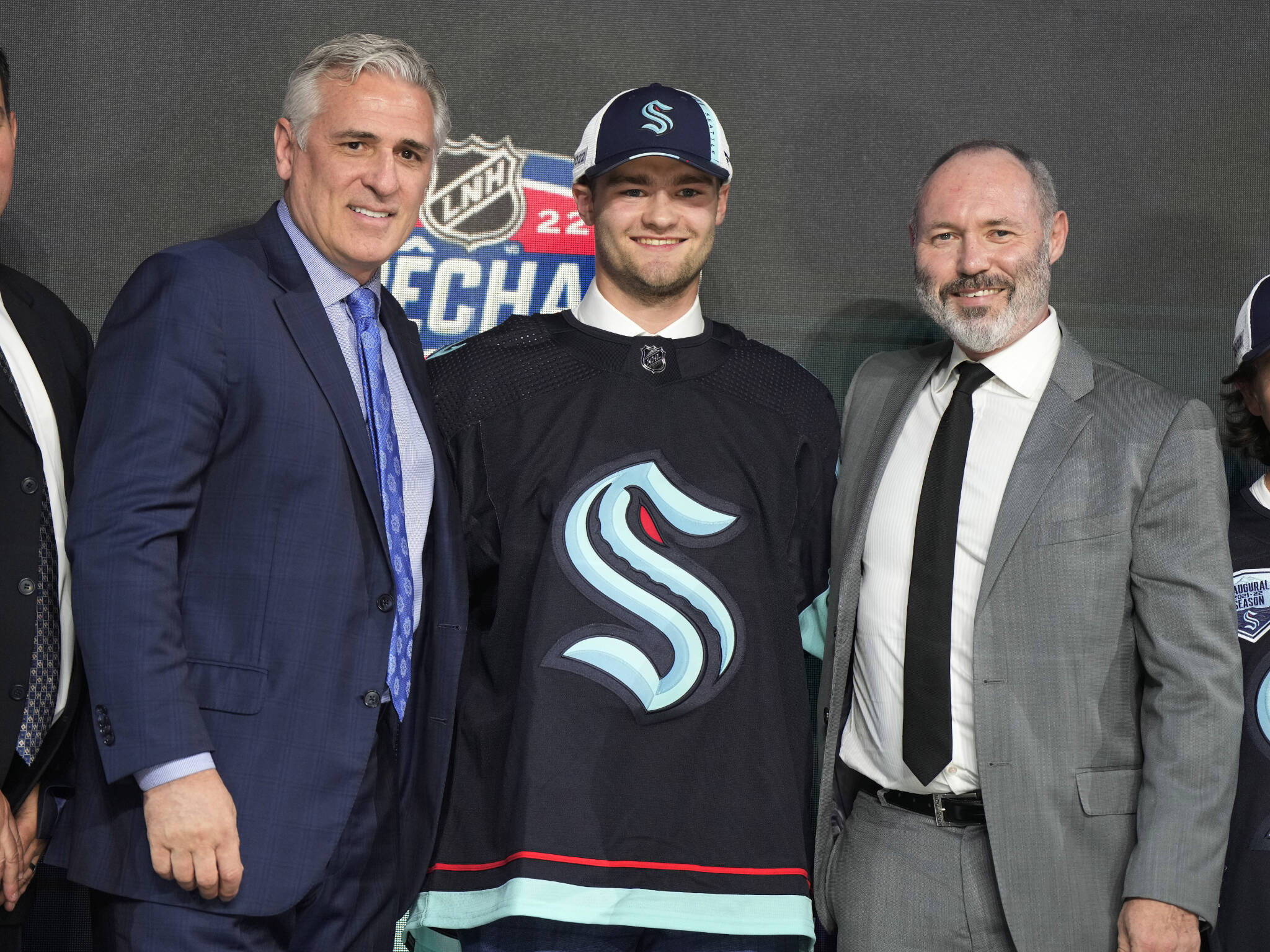 Shane Wright poses for photos after being selected by the Seattle Kraken with the fourth pick in the NHL draft on Thursday in Montreal. (Ryan Remiorz/The Canadian Press via AP)