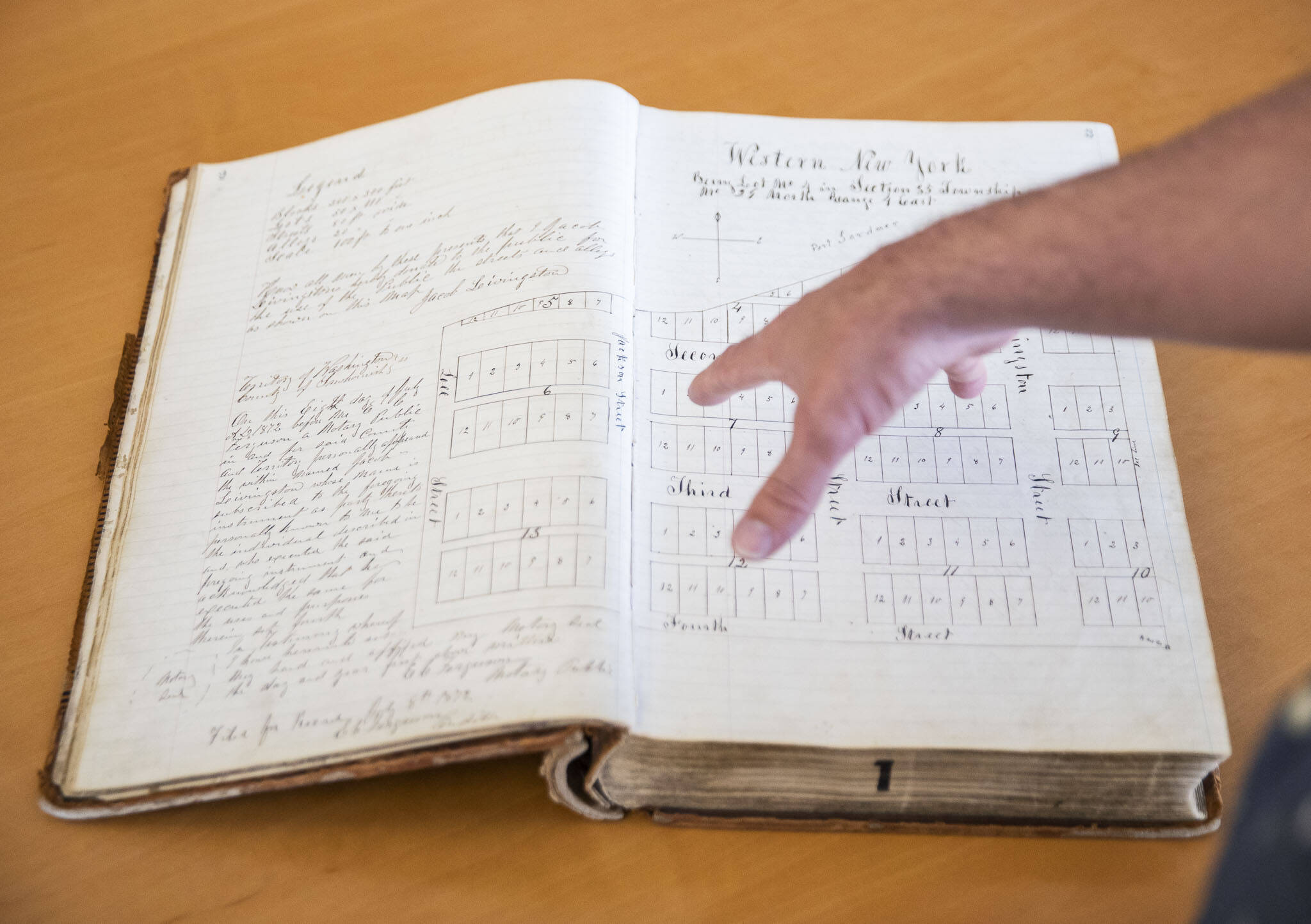 Inside the second page of Book 1 of the Snohomish County Deeds records on Tuesday, in Everett. (Olivia Vanni / The Herald)