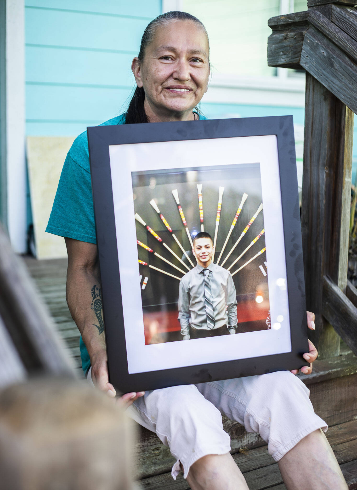 Lahneen Fast Horse holds a photographer of her son Andrew Fryberg, 15, who was one was one of five teenagers that was killed at Marysville Pilchuck High School on Oct. 24, 2014. (Olivia Vanni / The Herald)