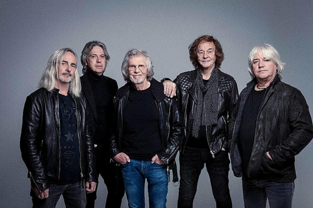The Zombies, including Rod Argent (third from left) and Colin Blunstone (fourth from left), perform July 15 at the Historic Everett Theatre.
