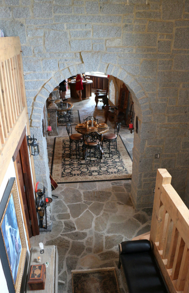 A view of the first floor of Castle Von Frandsen. It’s a two-bedroom, two-bath home but could be turned into a hotel, the owner says. (Caroline Lobsinger / Bonner County Daily Bee)
