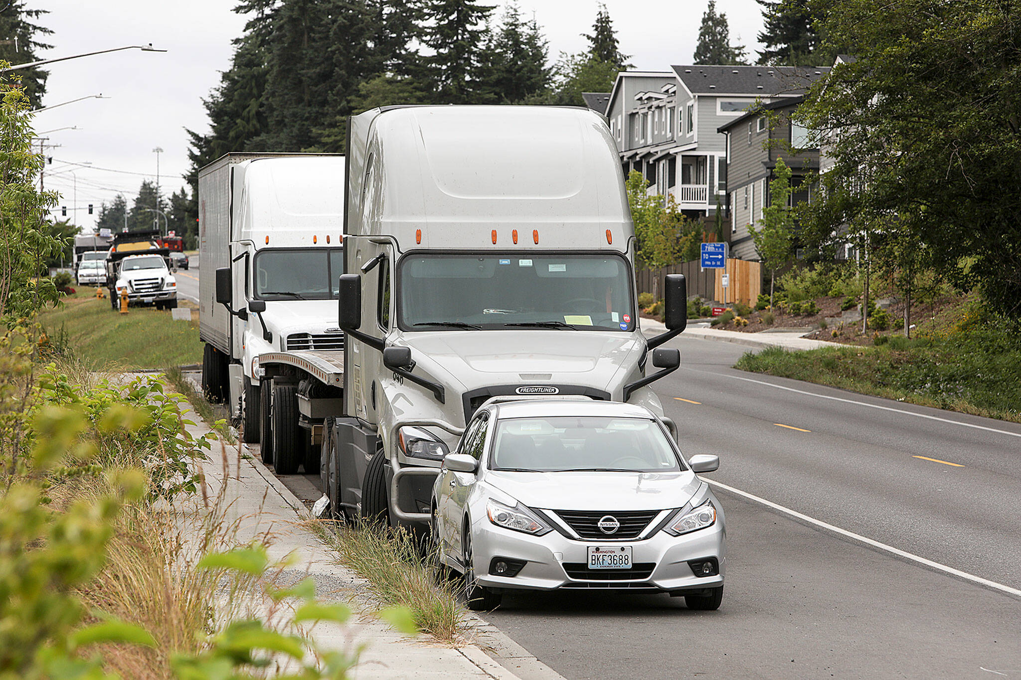 In 2019 Snohomish County adopted a 12-hour parking limit within a 24-hour period for tractor trailers and other large vehicles in urban residential areas outside city limits. (Lizz Giordano / Herald file)