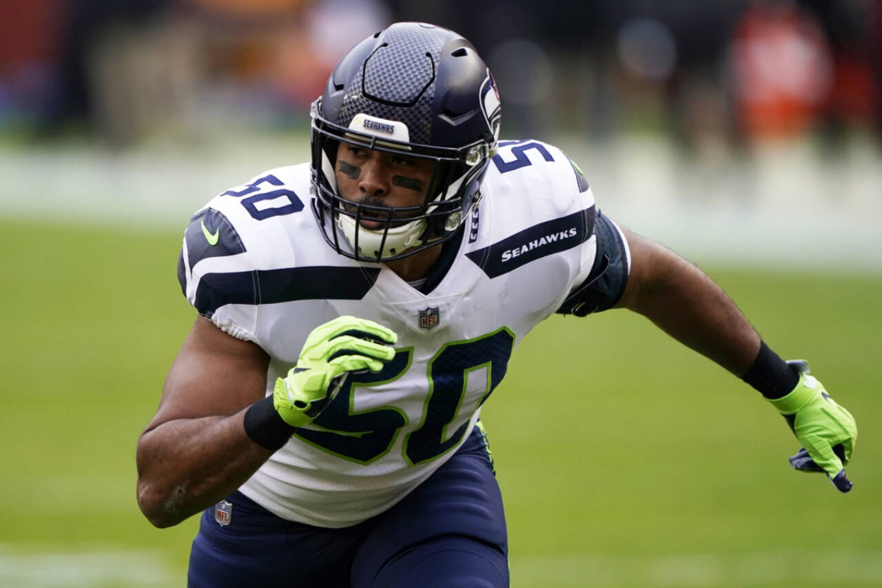 Seattle Seahawks outside linebacker K.J. Wright rushes during the team’s game against the Washington Football Team on Dec. 20, 2020 in Landover, Md. (AP Photo/Mark Tenally, File)