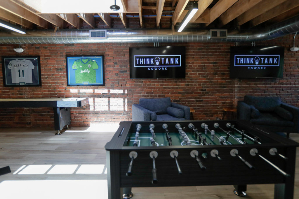 The upper floor of Think Tank Cowork features amenities for hosting a party, recording a podcast and tele-work Tuesday afternoon in Everett, Washington on July 19, 2022. (Kevin Clark / The Herald)
