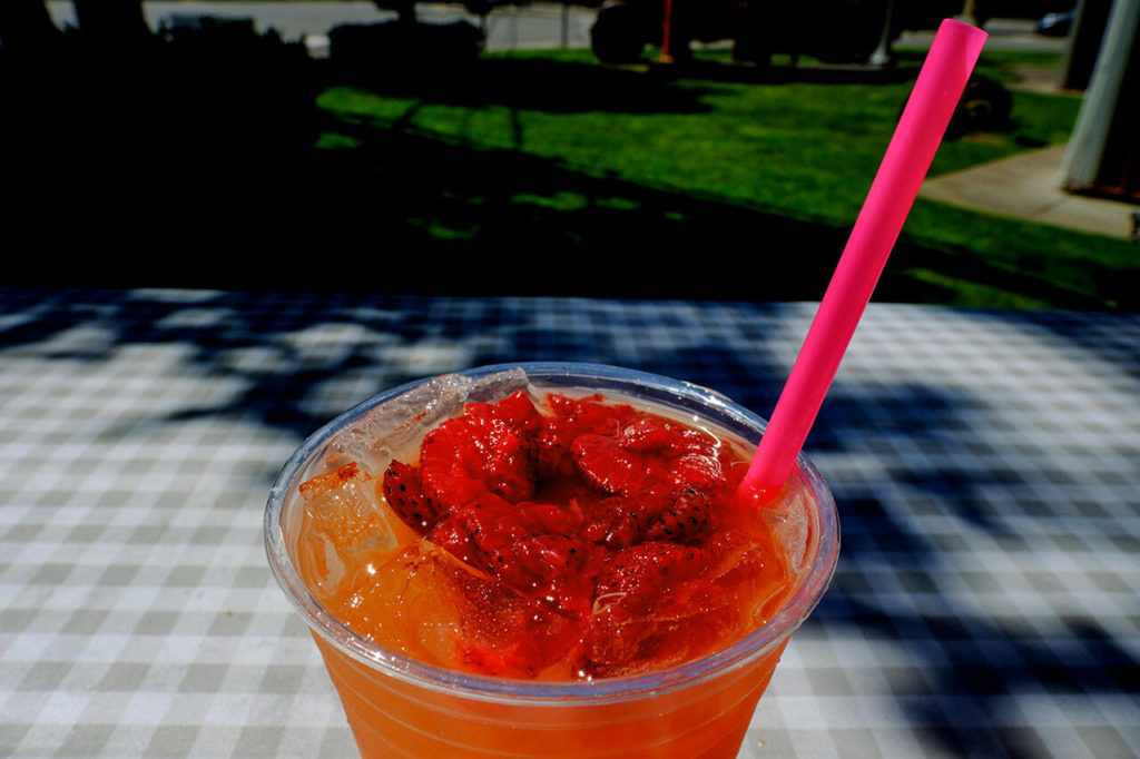 Grab a refreshing strawberry lemonade from the coffee stand adjacent to Nutty’s Junkyard in Arlington. Taylor Goebel / The Herald photo
