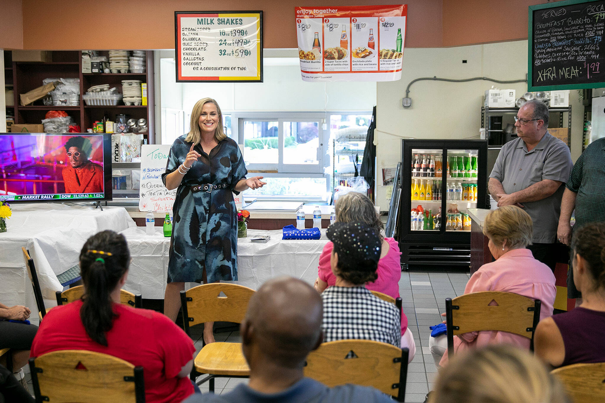 Tiffany Smiley, who is running as a Republican for U.S. Senate, speaks to a small group of supporters on July 28, at the Chevron Gas Station on Everett Mall Way in Everett. (Ryan Berry / The Herald)