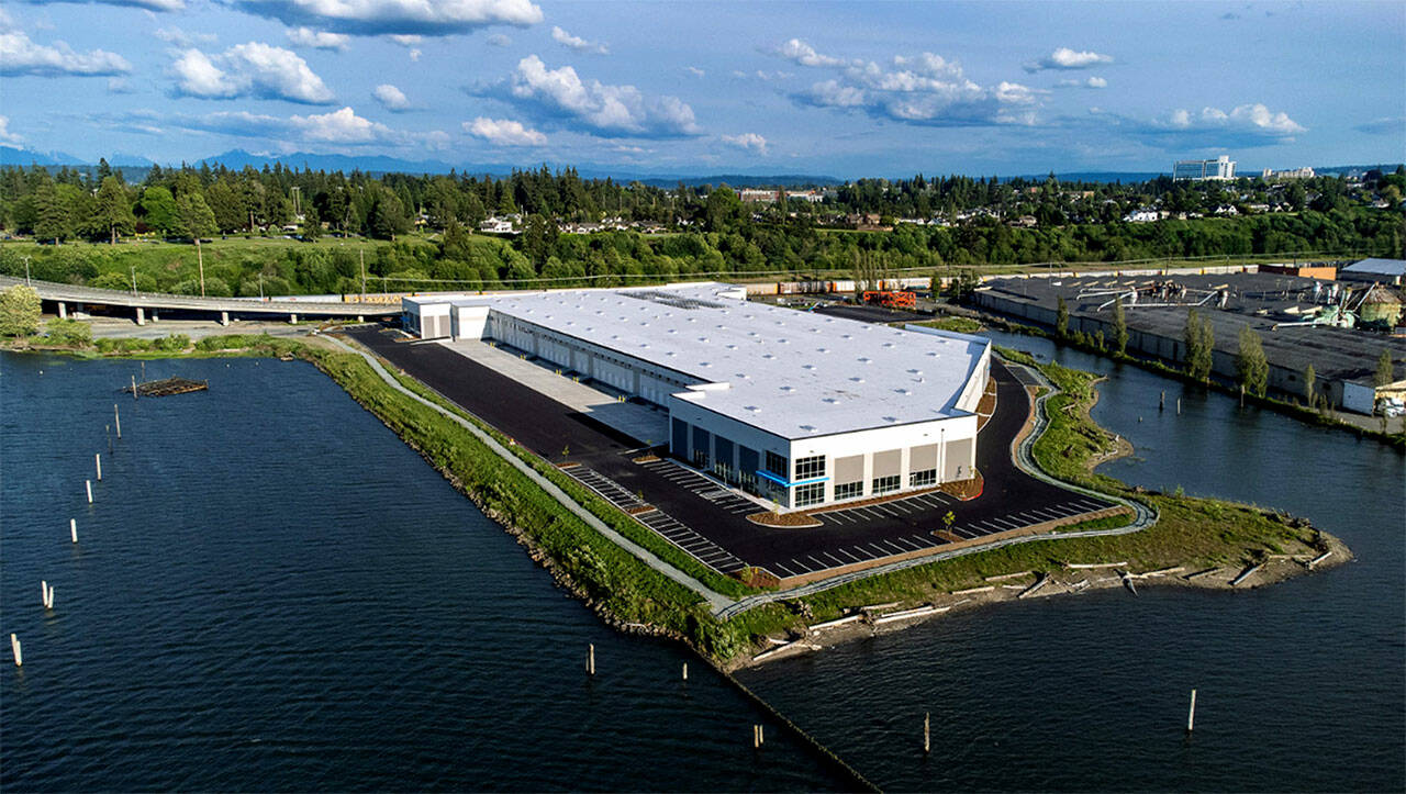 OnTrac Logistics has leased a building now under construction at Bay Wood Business Park on Everett's waterfront. The shipping company will open a facility there later this year that will employ 400 people. (Artist Rendering/Broderick Group.)