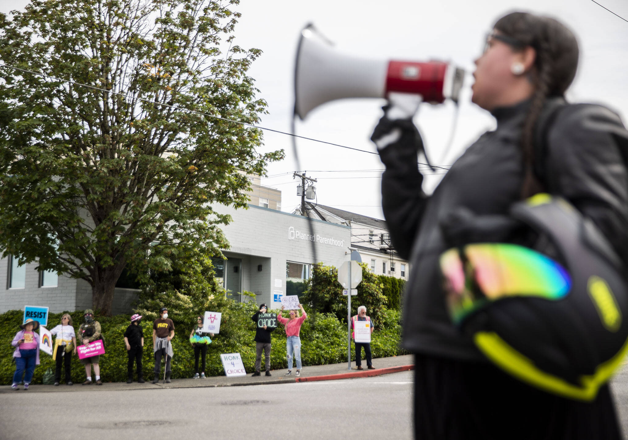 Abortions rights protesters fill all four corners of the intersection in front of the Everett Planned Parenthood in support of abortion rights on July 9. (Olivia Vanni / The Herald)