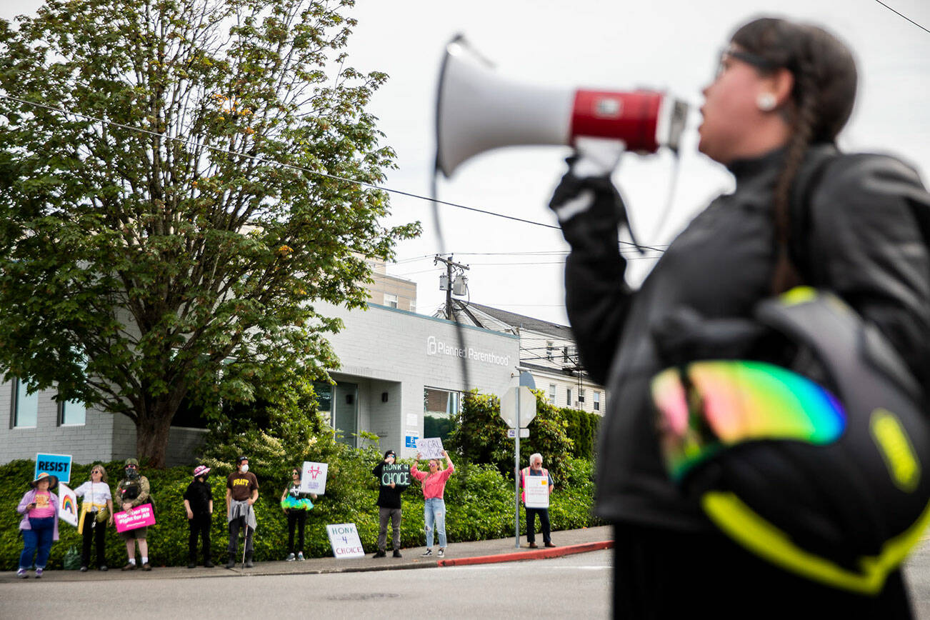 Abortion rights protesters fill all four corners of the intersection in front of the Everett Planned Parenthood in support of abortion rights on Saturday, July 9, 2022 (Olivia Vanni / The Herald)