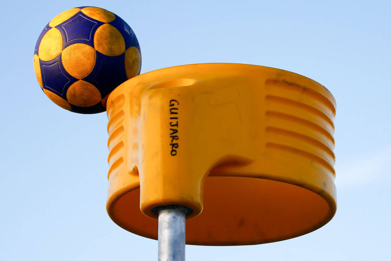 A korfball hits the edge of the basket Thursday evening at Mukilteo Beach on September 9, 2021. (Kevin Clark / The Herald)